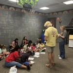 WGRC volunteers read bilingual, inclusive books to children at Tuscaloosa Public Library's Hispanic Heritage Celebration