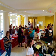 A view of the silent auction and a couple dessert tables